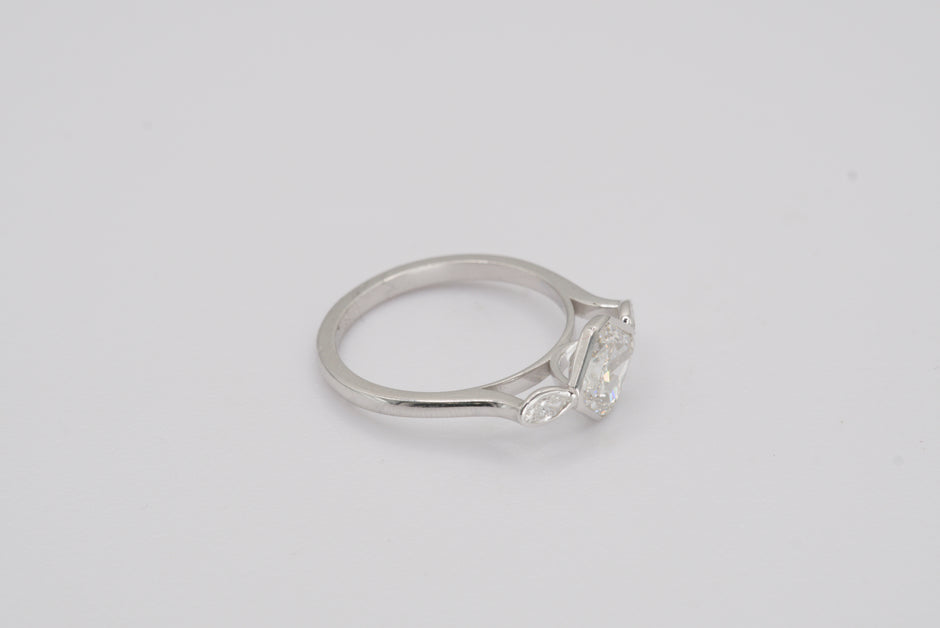 Luxe Cushion Cut Diamond Ring with Marquise Accents