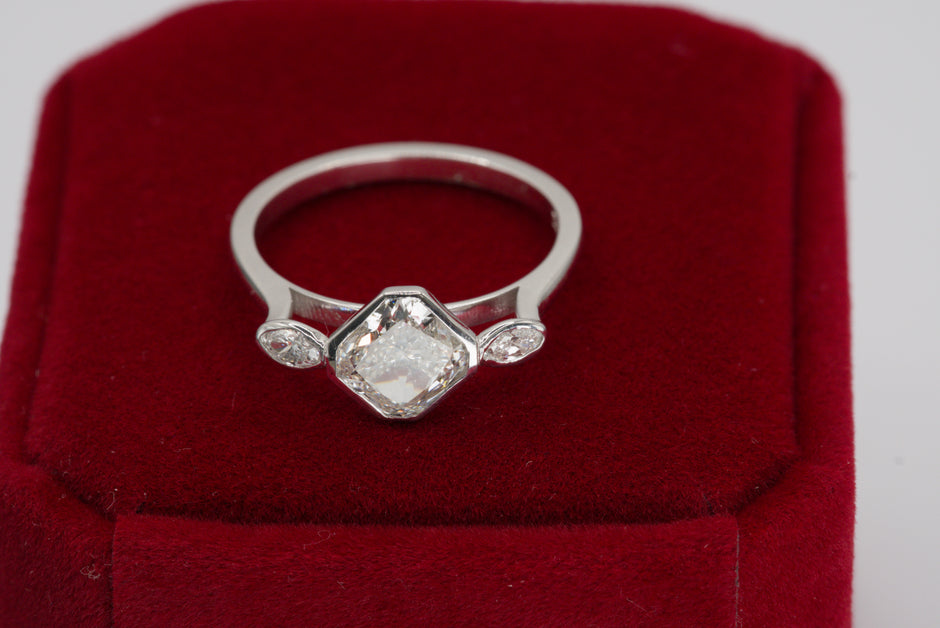 Luxe Cushion Cut Diamond Ring with Marquise Accents