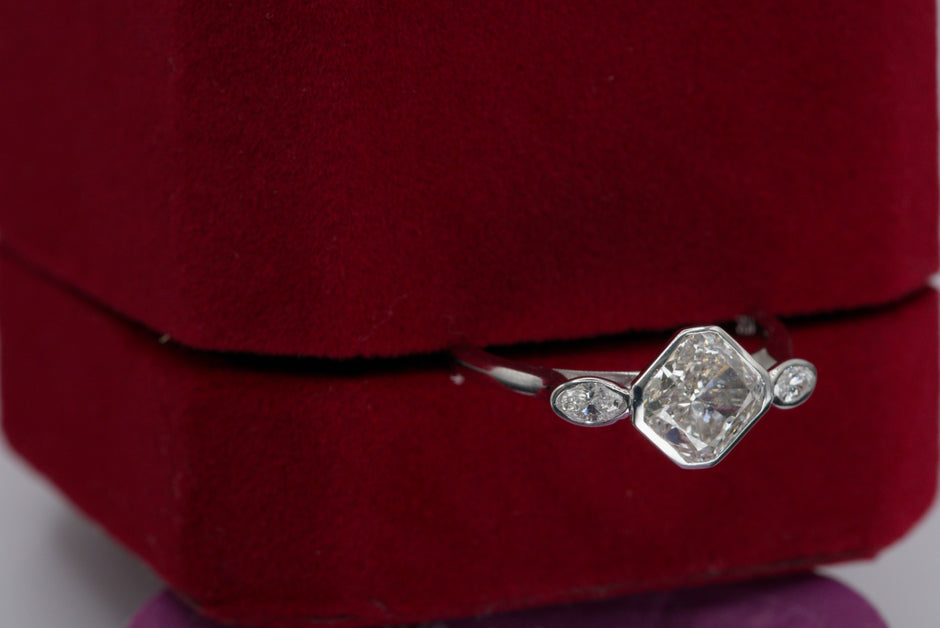 Luxe Cushion Cut Diamond Ring with Marquise Accents