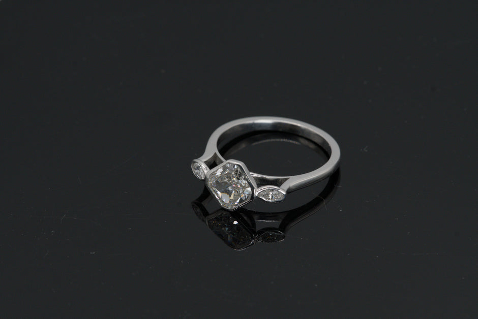 Luxe Cushion Cut Diamond Ring with Marquise Accents