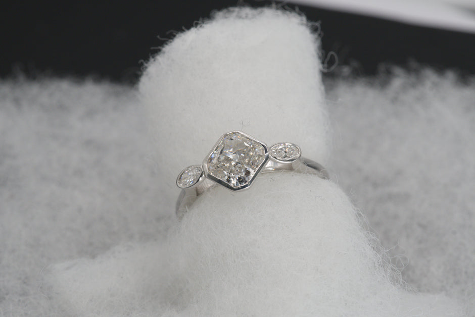 Luxe Cushion Cut Diamond Ring with Marquise Accents