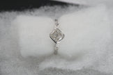 Luxe Cushion Cut Diamond Ring with Marquise Accents
