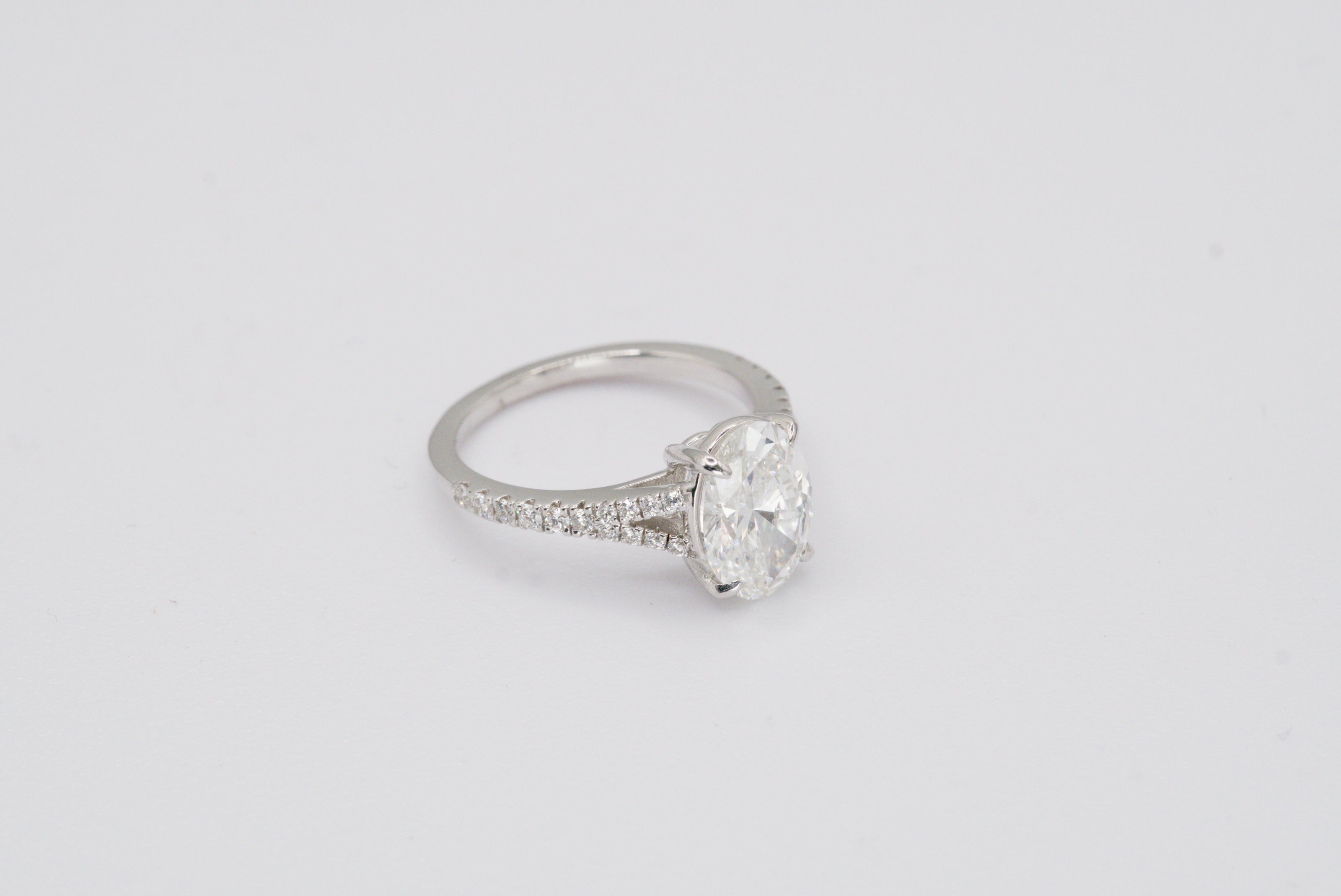 IGI Certified Oval Diamond Solitaire Split Shank Ring in White Gold