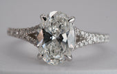 IGI Certified Oval Diamond Solitaire Split Shank Ring in White Gold